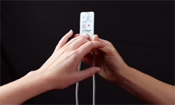 measuring patient's finger to determine correct Masimo Pronto sensor size